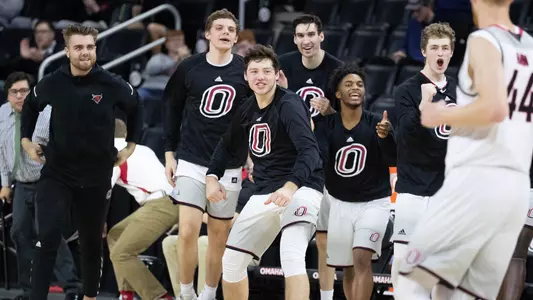 Omaha men's basketball bench celebration
