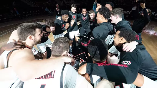 Men's basketball huddle