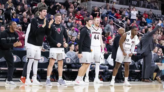 Omaha men's basketball bench celebration
