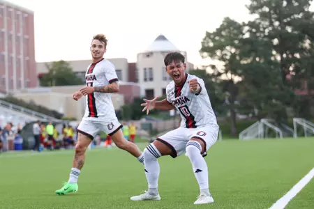 Theo Klein (right) celebrates one of his two goals against Florida Atlantic as Omaha downed the Owls 3-2 at Caniglia Field, August 25, 2024.