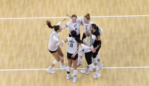 Mavericks volleyball team huddle