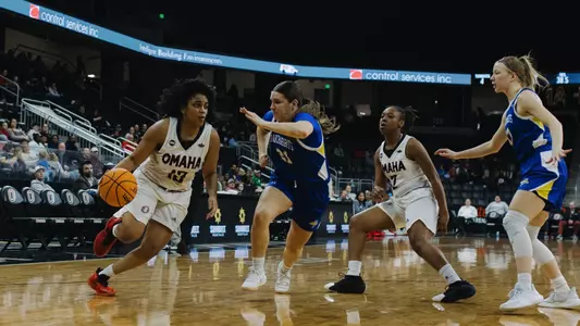 Alana Powell drives versus SDSU