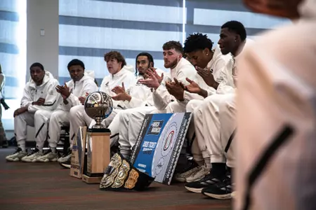 Players watch the 2025 NCAA Men's Selection Show