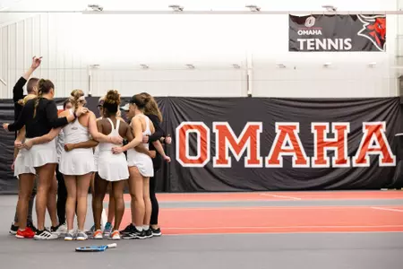 Women's tennis huddle