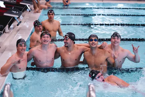 Mens swim celebrates win over SDSU