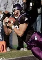 John Cerasani is forced<br>out of bounds on a<br>nine-yard pass<br>play in the<br>first quarter Saturday.