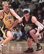 Steve Lepore fights for<BR>a loose ball during<BR>the first half Tuesday night.