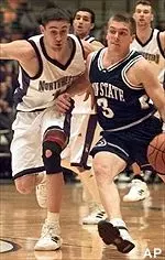 Penn State's Joe Crispin drives against Northwestern's Steve Lepore in the first half Thursday.