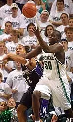Tavaras Hardy battles MSU's Zach Randolph in the first meeting on January 10