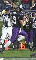 Zak Kustok runs for one of his three touchdowns against Penn State Saturday.