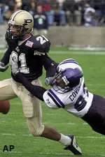 Raheem Covington strips the ball from Taylor Stubblefield in Northwestern's game with Purdue Saturday.
