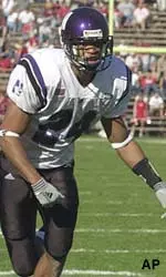 Herschel Henderson readies to make a tackle in Northwestern's loss to Indiana Saturday.