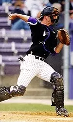Catcher Joe Hietpas scored the winning run in the 10th inning to defeat Indiana 6-5.