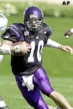 Zak Kustok rushed for 105 yards and was 23-of-40 for 231 yards passing in Northwestern's 27-26 victory Saturday.