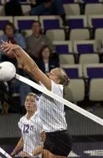 Erika Lange recorded nine block assists Friday night to move into second place on NU's all-time list.
