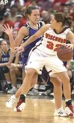 Northwestern's Natalie Will defends against Wisconsin's Kyle Black during the first half.