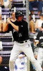 Junior Brandon Ackley hit his frist triple of 2002 in an 8-7 loss to Washington