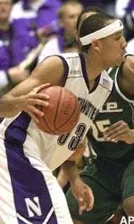 Northwestern forward Tavaras Hardy moves around Michigan State forward Aloysius Anagonye in the first half.