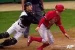 Junior catcher Ken Padgett tags out Ohio State's Mike Rabin at the 2002 Big Ten Tournament