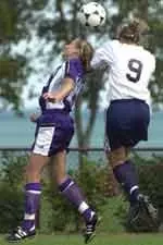 Carolyn Hack (left) headed home her first goal of 2002 Sunday at Illinois