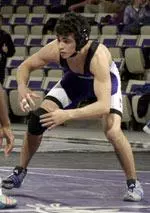 Sophomore John Velez improved to 18-12 on the season.