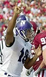 Jason Wright reacts to his 13-yard touchdown run against Indiana during the second quarter in Bloomington.