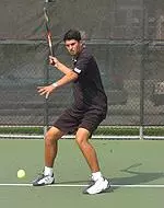Chuck Perrin survived in three sets to advance to the Round of 16.