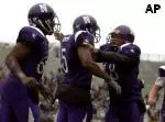 The Wildcats celebrate Brandon Horn's go-ahead touchdown on Saturday.