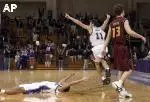 Vedran Vukusic (11) and T.J. Parker (on ground) exult after Parker's game-winning shot Wednesday night