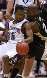 Purdue's Kenneth Lowe is trapped between Jitilm Young and Aaron Jennings in the first half.