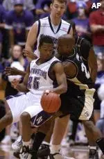 Aaron Jennings (back) and Jitim Young were two of five NU players scoring in double figures Wednesday