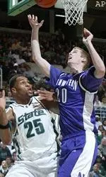 Jimmy Maley battles with Michigan State's Aloysius Anagonye for a rebound, Saturday.