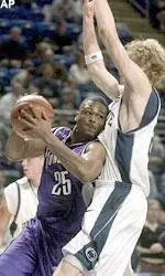 Northwestern's Jitim Young drives to the basket against Penn State's Jan Jagla in the first half Wednesday.