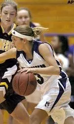 Breanne Smilie tries to drive around Minnesota defender Lindsay Whalen during the first half.