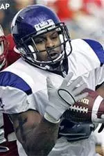Northwestern's Marvin Ward intercepts a pass in front of Wisconsin receiver Darrin Charles (87) in the first half.