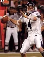 Northwestern quarterback Brett Basanez looks to pass against Hawaii during the first quarter. (AP Photo/Ronen Zilberman)