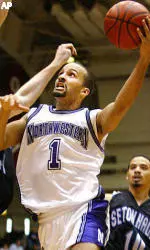 T.J. Parker goes up for a shot against Seton Hall center Grant Billmeier in the second half.