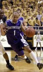 T.J. Parker drives on Purdue's Kenneth Lowe in Wednesday's win at West Lafayette.