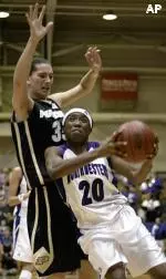 Guard Ifeoma Okonkwo drives to the basket.