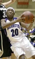 Guard Ifeoma Okonkwo drives to the basket.