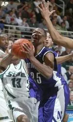 Jitim Young splits the Michigan State defense in the first half.