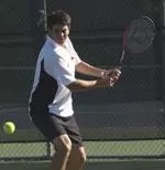Chuck Perrin's win at No. 3 clinched the match for NU, which beat Wisconsin for the 16th-straight time.