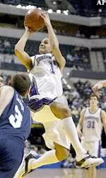 T.J. Parker shoots over Penn State's Ben Luber during the first half.