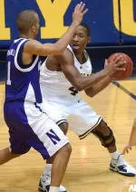 Michigan guard Daniel Horton is guarded by T.J. Parker during the second half.