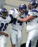 Brett Basanez is congratulated on one of his two rushing TD's vs. Michigan State.