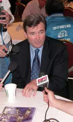 Head coach Bill Carmody yields questions at the morning roundtable session.