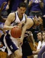 Tim Doyle and Penn State's Aaron Johnson fight for a rebound in the second half.