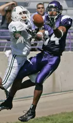 Northwestern receiver Kim Thompson tries to catch a long pass in the second quarter at Ryan Field in Evanston, Ill. (AP Photo/Brian Kersey)