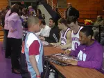 The men's basketball team will be on hand at Wildcat Alley before Saturday's football game.