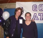 Head coach Kelly McCollum and Northwestern alum Christine Brennan pause for a picture at the 2006 Dinner with the 'Cats.